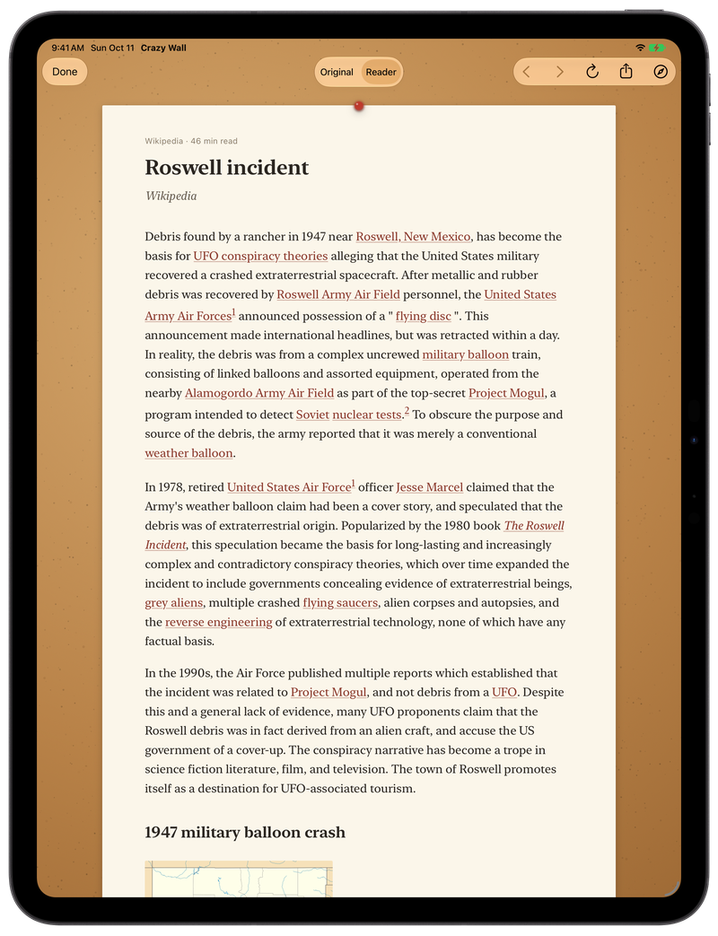 Reader on iPad: Wikipedia's Roswell incident article on a sheet of paper pinned over the cork, with an Original and Reader switch at the top.